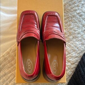 Tod's women’s  Vibrant Red Leather Slip-Ons